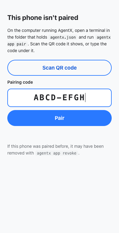 The "This phone isn't paired" page with the Scan QR code button and a code being typed